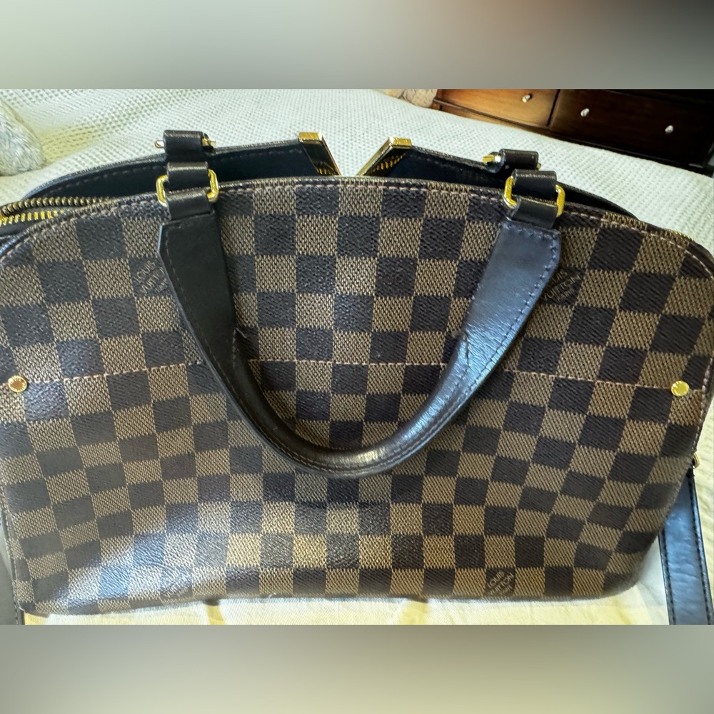 Cross body Louis Vuitton hardly worn purse